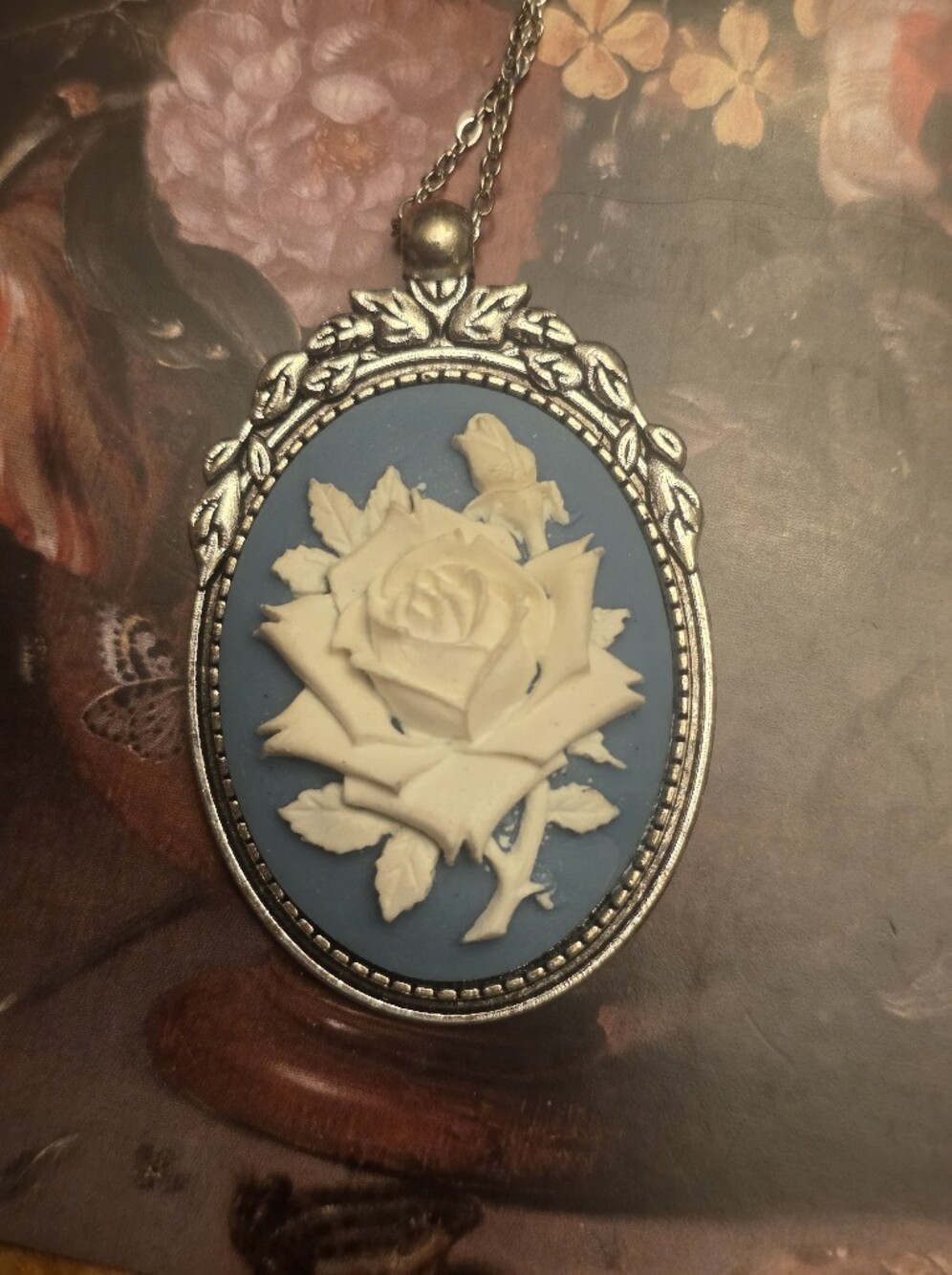 White Rose On Powder Blue, Silver Frame With Stainless Steel Chain Necklace